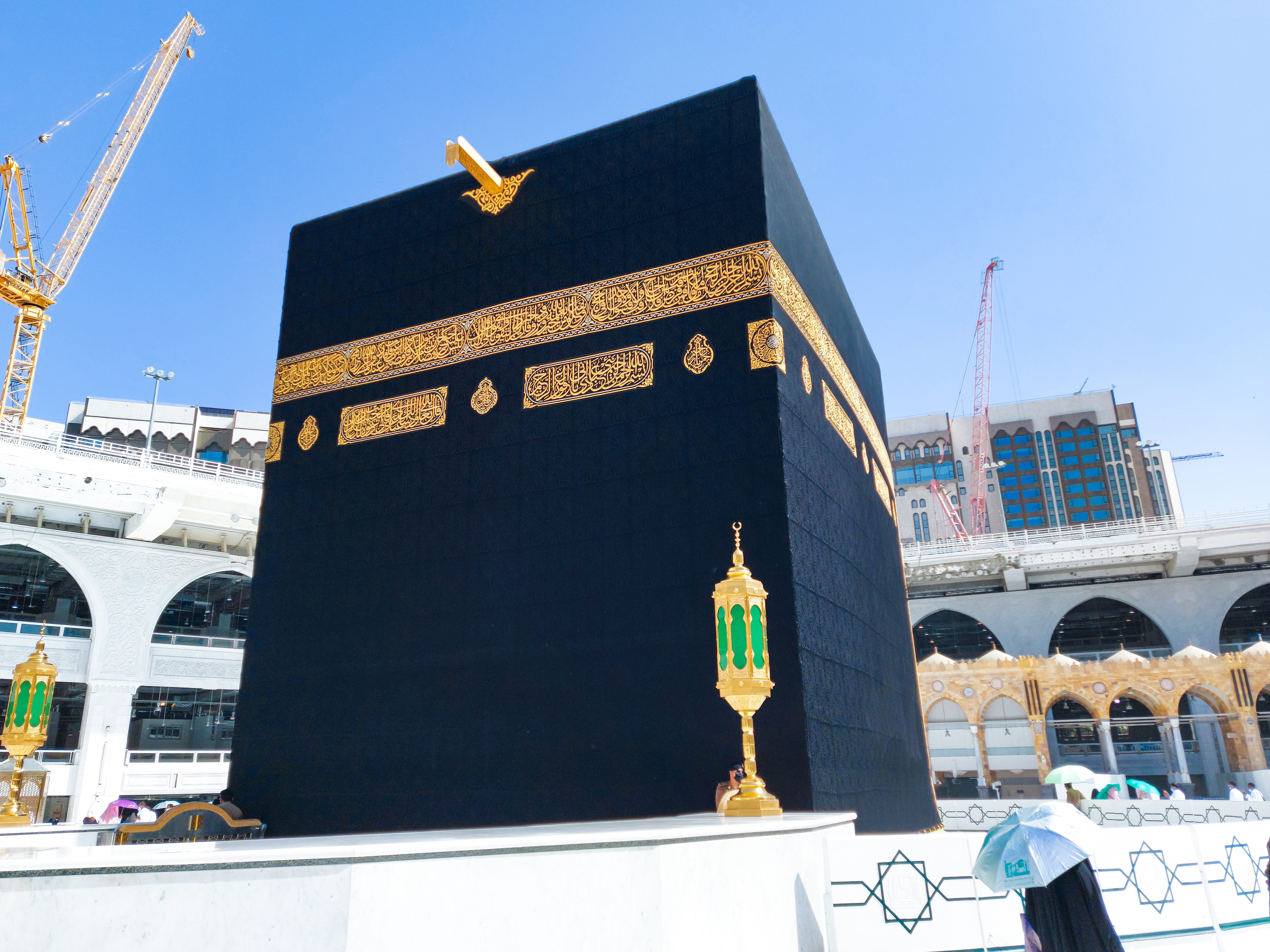 pilgrims in kaaba in macca al haram umrah socially distanced coronavirus restrictions face mask